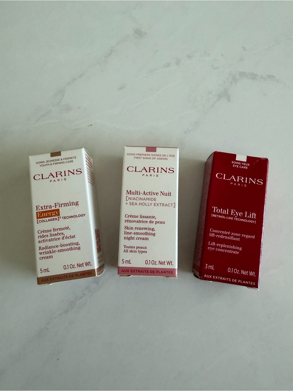 Clarins SkinCare Trio - Firming Cream, Eye Cream, Moisturizer Minis